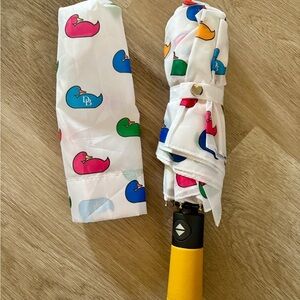 Dooney & Bourke Pink and White Umbrella Accessories